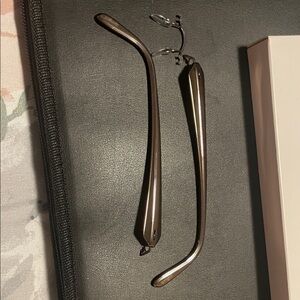 Stylish Black Eyeglass Temples.